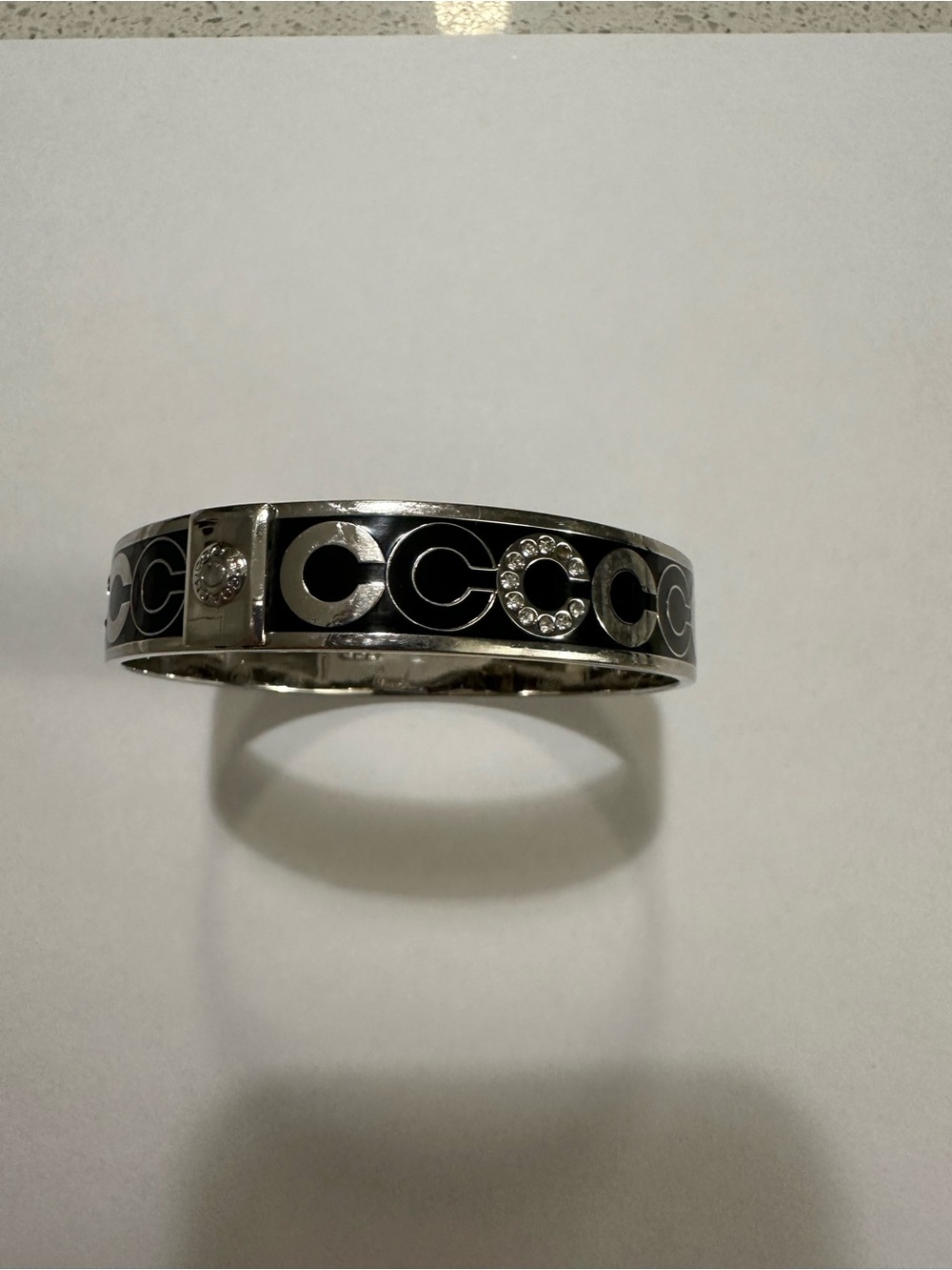 Coach Black Enamel and Silver Logo Bangle Bracelet with a few sparkle “C”’s - Picture 3 of 3